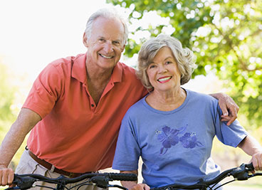 Photo of a man and woman on bicycles. Link to Life Stage Gift Planner Ages 60-70 Situations. Photo of a man and woman on bicycles. Link to Life Stage Gift Planner Ages 60-70 Situations.